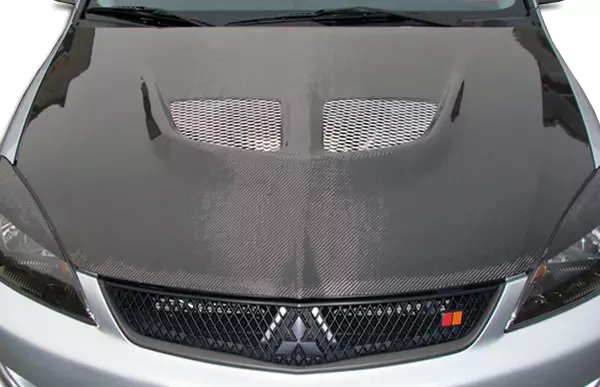 2004-2007 Mitsubishi Lancer Carbon Creations Evo Hood 1 Piece - Image 1