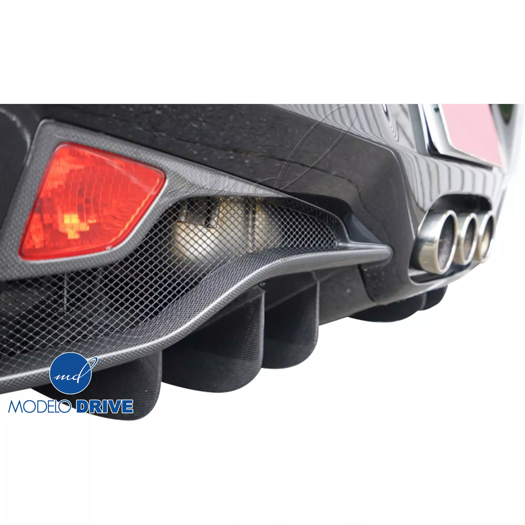 ModeloDrive Carbon Fiber OER Rear Fog Light Surround Garnishes > Ferrari 458 2015-2020 - Image 1
